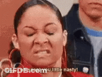 A Woman Is Making A Funny Face And Saying `` Oh Snap You Little Nasty '' . GIF