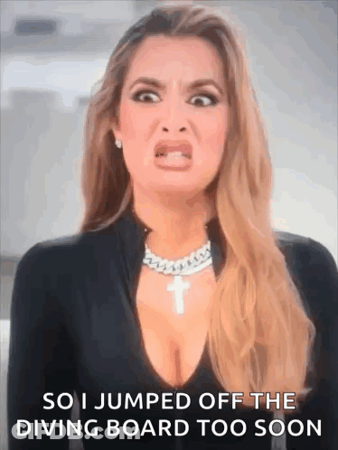 A Woman Is Making A Funny Face And Saying `` So I Jumped Off The Diving Board Too Soon '' GIF