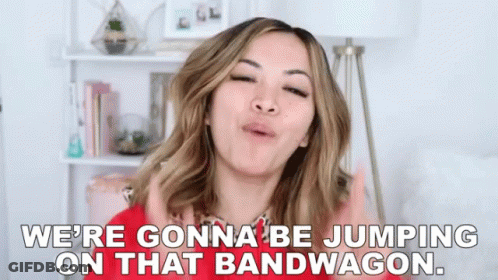 A Woman Is Making A Funny Face And Saying `` We 'Re Gonna Be Jumping On That Bandwagon . '' GIF