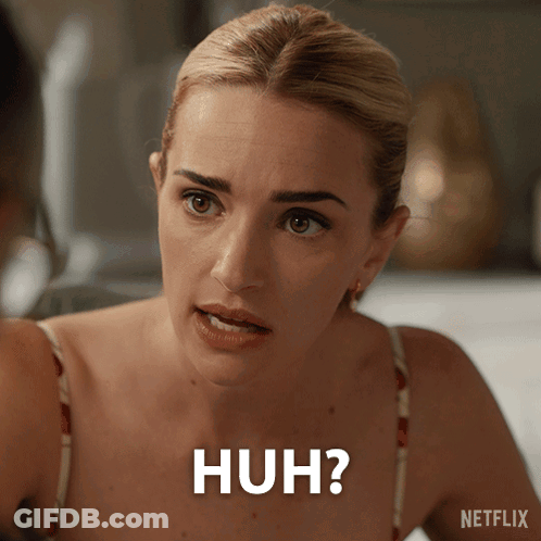 A Woman Is Making A Funny Face And The Words Huh Are On Her Face GIF