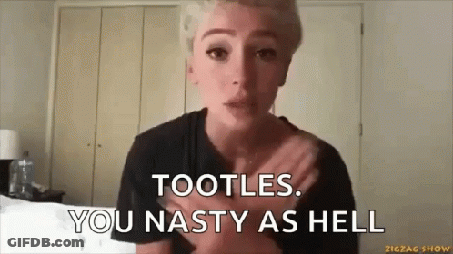 A Woman Is Making A Funny Face While Holding Her Chest And Saying Tootles . You Nasty As Hell . GIF