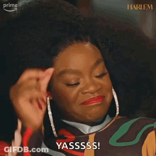 A Woman Is Making A Funny Face While Holding Her Hair And Saying Yasssss . GIF