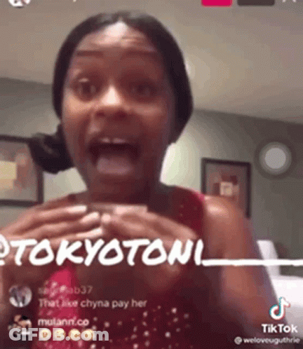 A Woman Is Making A Funny Face While Talking On A Tiktok Video . GIF
