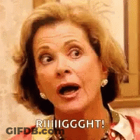 A Woman Is Making A Funny Face With Her Mouth Open And A Shocked Look On Her Face . GIF
