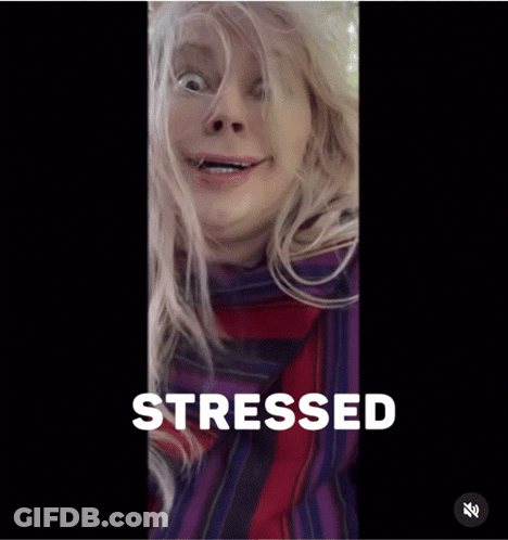 A Woman Is Making A Funny Face With The Word Stressed Behind Her GIF