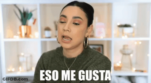 A Woman Is Making A Funny Face With The Words Eso Me Gusta Behind Her GIF