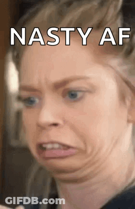 A Woman Is Making A Funny Face With The Words `` Nasty Af '' Written On The Bottom . GIF