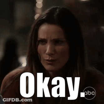A Woman Is Making A Funny Face With The Words Okay Written On Her Face GIF