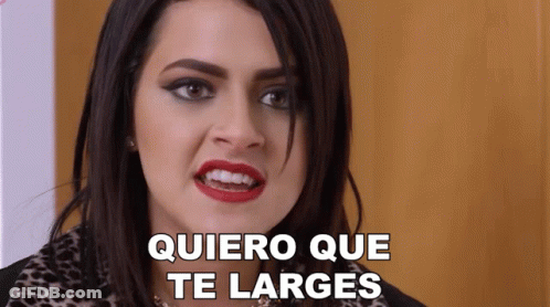 A Woman Is Making A Funny Face With The Words Quiero Que Te Larges Above Her GIF