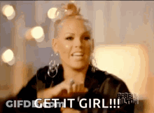 A Woman Is Making A Gesture With Her Hands And Says Get It Girl ! GIF