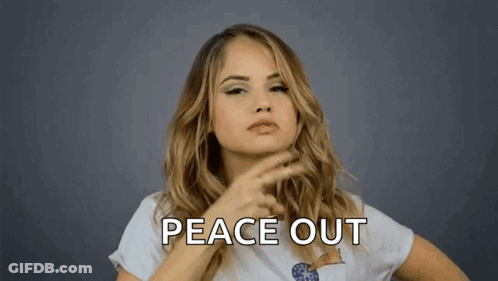 A Woman Is Making A Peace Out Sign With Her Finger GIF