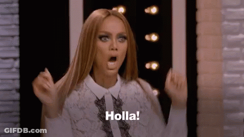 A Woman Is Making A Surprised Face And Saying Holla ! GIF
