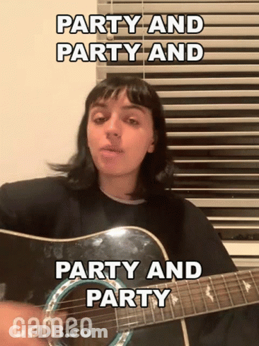 A Woman Is Playing A Guitar In Front Of A Window And Singing Party And Party And Party And Party . GIF