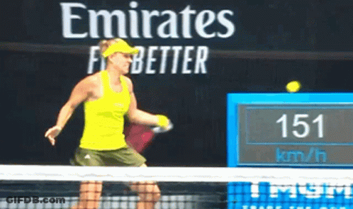 A Woman Is Playing Tennis In Front Of A Sign That Says Emirates Better GIF