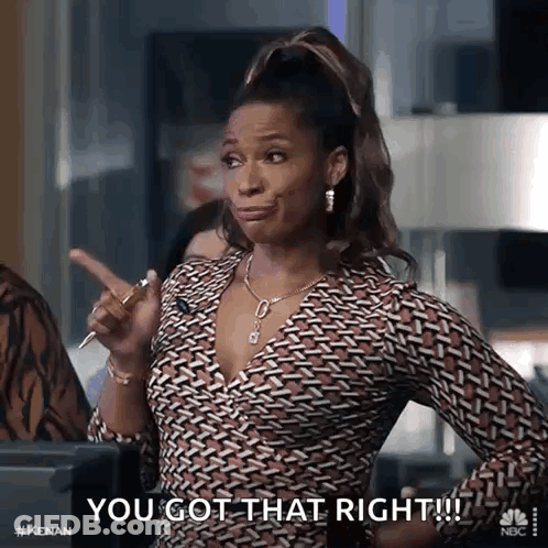 A Woman Is Pointing At Something And Saying `` You Got That Right '' While Holding A Pen In Her Hand . GIF