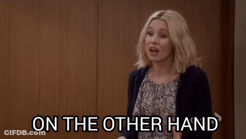 A Woman Is Pointing At Something With The Words " Snitches Do Get Stitches " Written Below Her GIF
