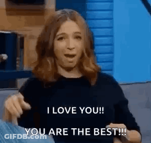A Woman Is Pointing At The Camera And Saying `` I Love You ! You Are The Best !! '' GIF