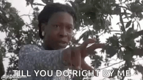 A Woman Is Pointing At The Camera While Standing In Front Of A Tree And Saying `` Till You Do Right By Me '' . GIF