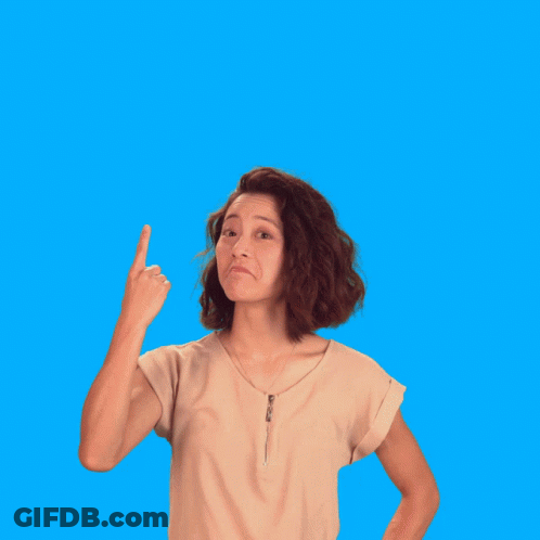 A Woman Is Pointing Up In Front Of A Sign That Says Fact GIF