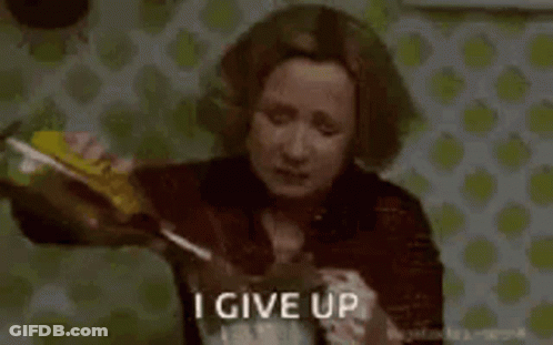 A Woman Is Pouring A Bottle Of Alcohol Into A Glass . GIF
