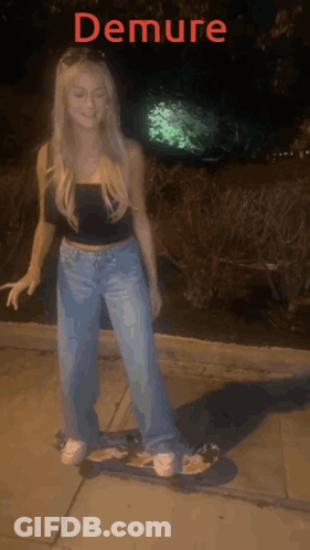 A Woman Is Riding A Skateboard With The Word Demure On The Bottom Right GIF