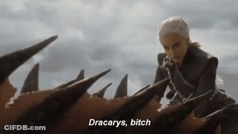 A Woman Is Riding On The Back Of A Dragon . GIF