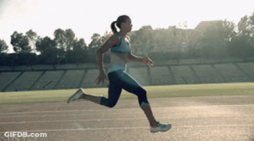 A Woman Is Running On A Track That Says Kinjyo On It GIF