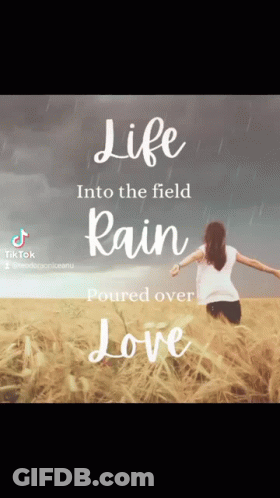 A Woman Is Running Through A Field With The Words Life Into The Field Rain Poured Over Love Written Above Her GIF