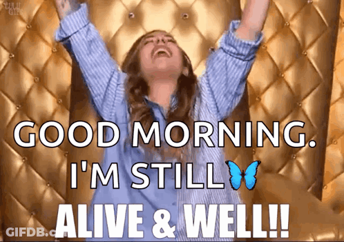 A Woman Is Saying Good Morning I 'M Still Alive & Well GIF