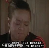 A Woman Is Saying I Dont Like People Playing On My Phone . GIF
