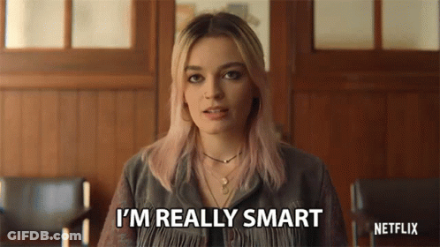 A Woman Is Saying I 'M Really Smart In Front Of A Netflix Logo . GIF