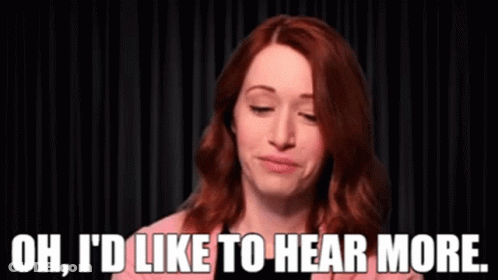 A Woman Is Saying Oh I 'D Like To Hear More GIF