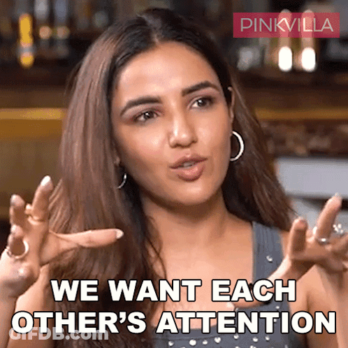 A Woman Is Saying " We Want Each Other 'S Attention " With Her Hands Outstretched GIF