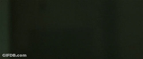 A Woman Is Screaming In A Dark Room GIF