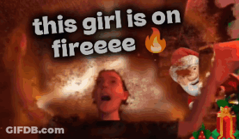 A Woman Is Screaming In Front Of A Fire With The Words " This Girl Is On Fireeee " GIF