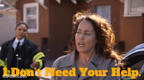 A Woman Is Screaming In Front Of A Sign That Says I Don T Need Your Help GIF