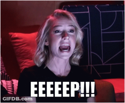 A Woman Is Screaming With The Word Eeeep Written On The Bottom Of Her Face GIF