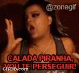 A Woman Is Screaming With The Words Calada Piranha Vou Te Perseguir Written Above Her GIF
