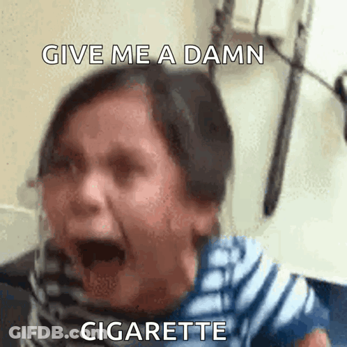 A Woman Is Screaming With The Words Give Me A Damn Cigarette Written Above Her GIF