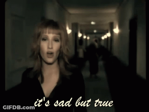 A Woman Is Singing In A Hallway With The Words It 'S Sad But True Below Her GIF