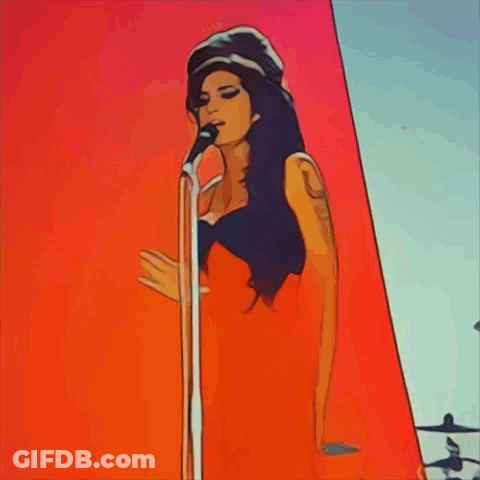 A Woman Is Singing Into A Microphone In Front Of A Red And White Wall GIF