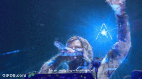 A Woman Is Singing Into A Microphone With The Words " Are You Ready To Go One More Time " Above Her GIF