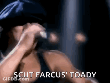 A Woman Is Singing Into A Microphone With The Words `` Scut Farcus ' Toady '' Written Below Her . GIF