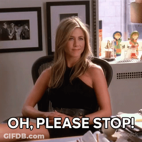 A Woman Is Sitting At A Desk With The Words Oh Please Stop Written Below Her GIF