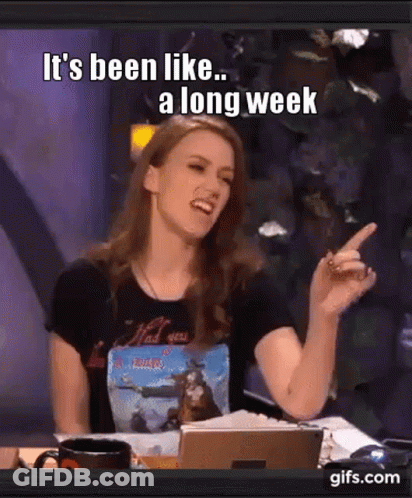 A Woman Is Sitting At A Table And Pointing At Something With The Words " It 'S Been Like A Long Week " GIF
