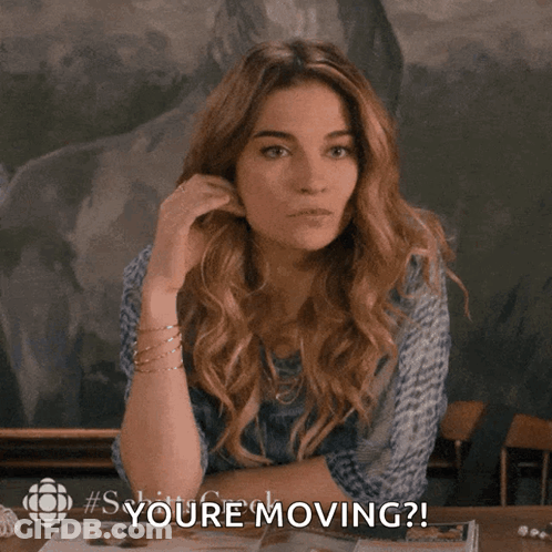Woman Sitting At Table Saying You're Moving GIF