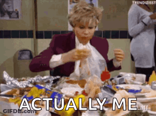 A Woman Is Sitting At A Table Eating Food And The Words Actually Me Are Visible . GIF