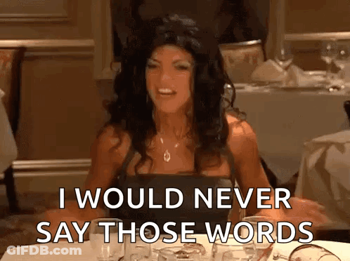 A Woman Is Sitting At A Table Saying I Would Never Say Those Words GIF