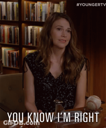 A Woman Is Sitting At A Table With A Baseball And Says " You Know I 'M Right " GIF