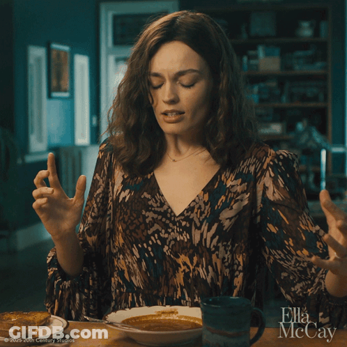 A Woman Is Sitting At A Table With A Bowl Of Soup And A Cup Of Coffee And Says " No " GIF